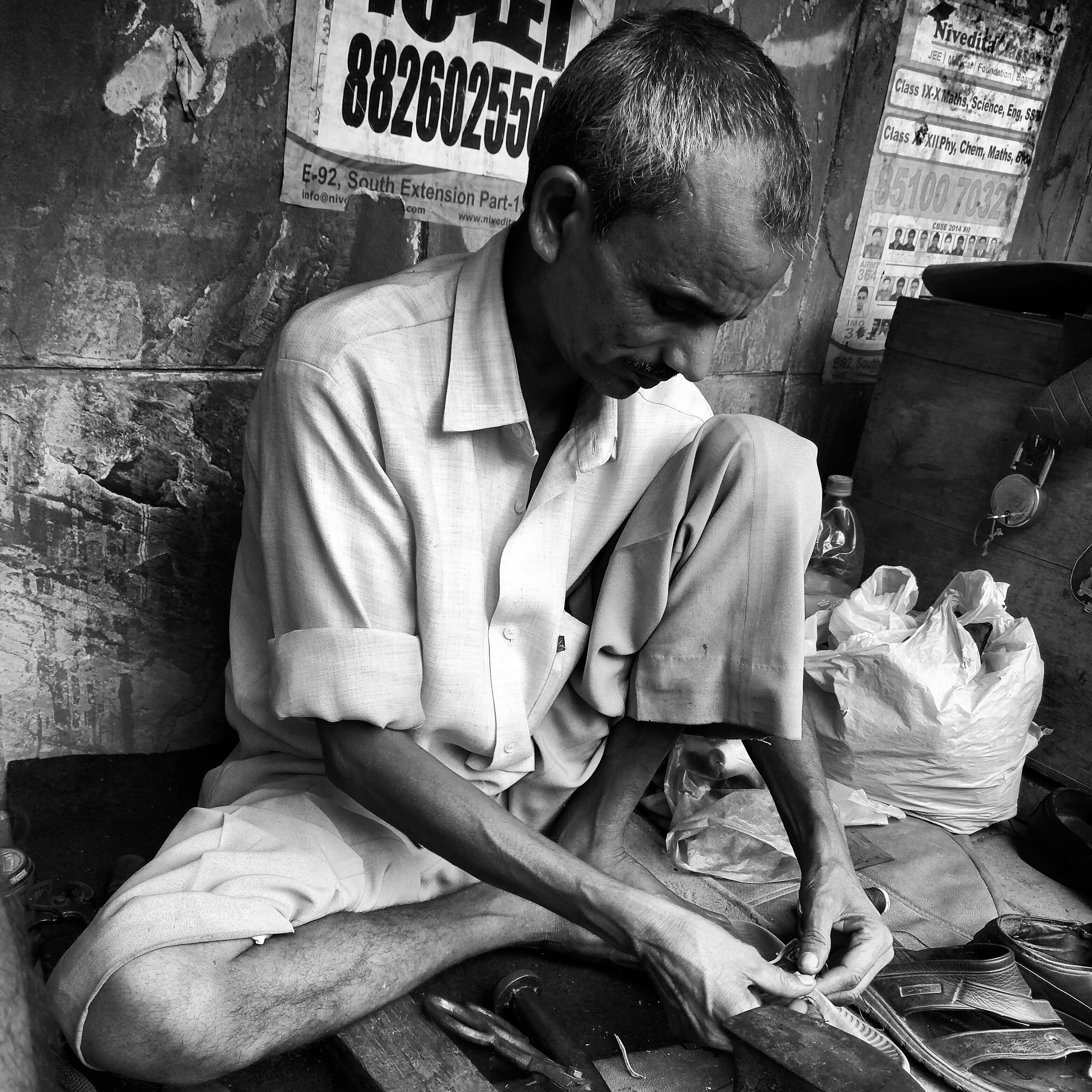 A Bihari migrant working as a cobbler in South Delhi’s semi-posh Gautam Nagar locality