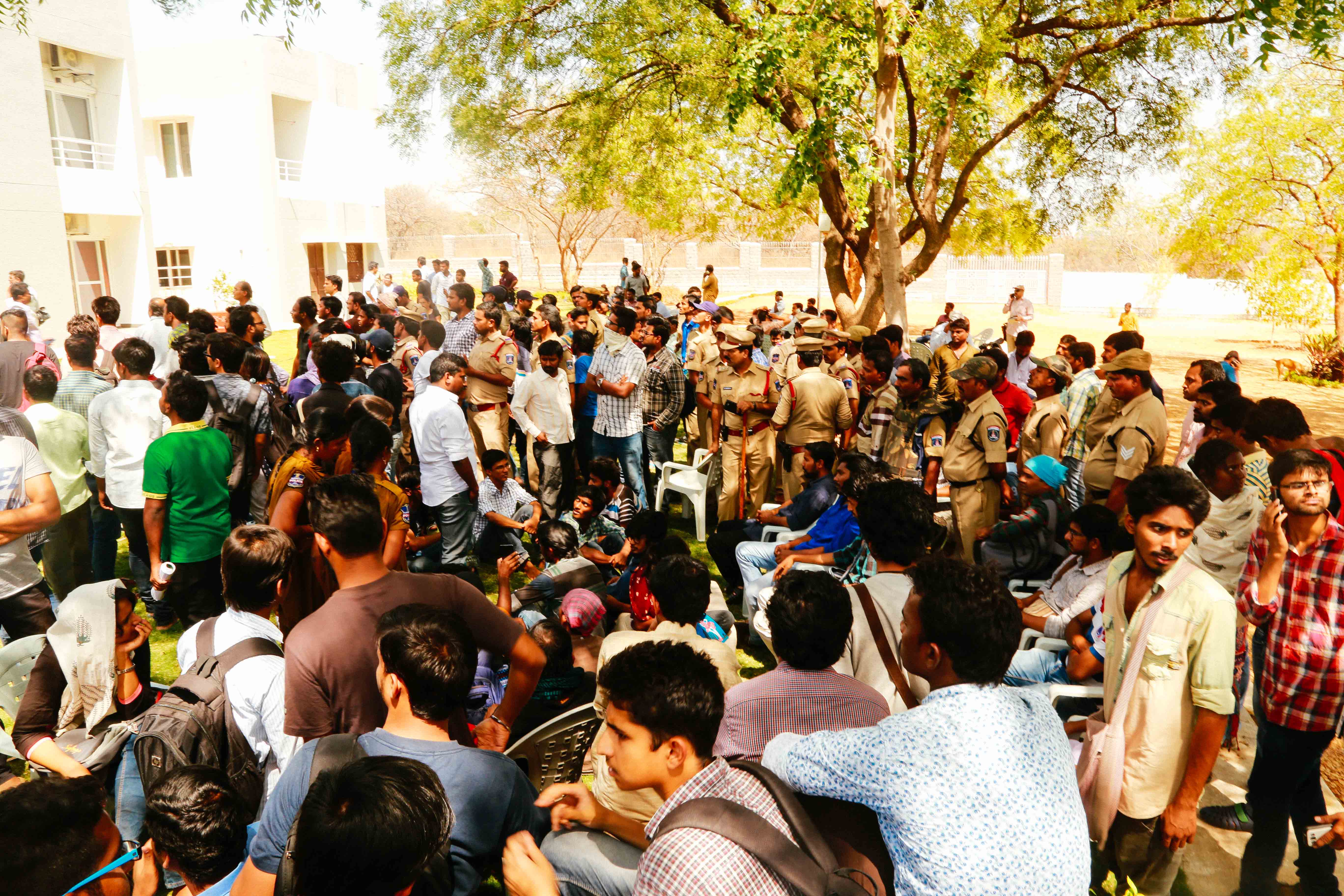 Students raising slogans against BJP and the state police