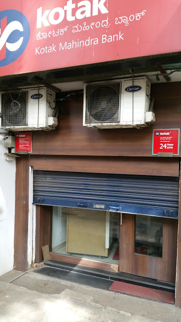 Another Kotak Mahindra ATM, out of service as indicated by the half shutters