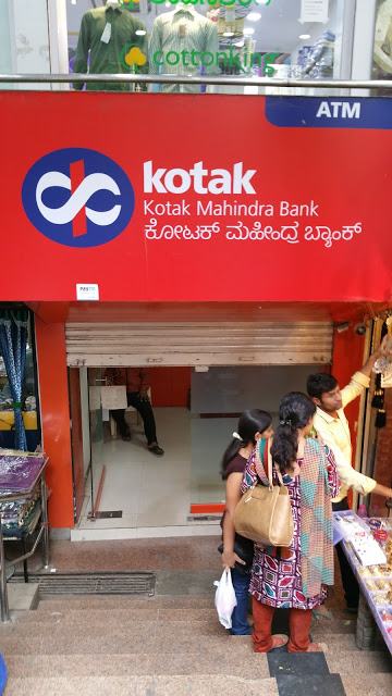 A third Kotak ATM. Note again the half shutters